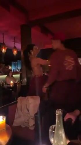 Belly dancer entertains diners at Marrakech restaurant evening