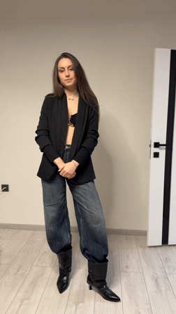 Woman showcases casual-chic outfit in Stara Zagora fashion display