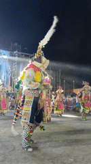 Traditional dancers perform at nighttime cultural event in Tacna