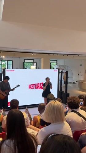 Sarah Toscano performs at Milan's Circolo Mondiale football event