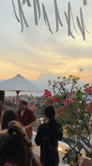 Rooftop sunset party and food moments in Bali