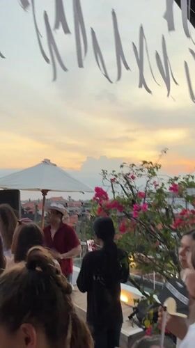 Rooftop sunset party and food moments in Bali
