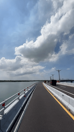 Morning traffic crosses bridge in South Denpasar, Indonesia
