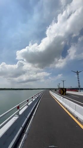 Morning traffic crosses bridge in South Denpasar, Indonesia