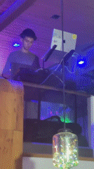 Nightclub night in Sozopol, DJ set and dancing crowd