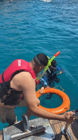 Woman takes selfies during Red Sea boat trip, Egypt