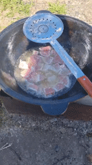 Traditional outdoor cooking documented in Rusalevka, Russia