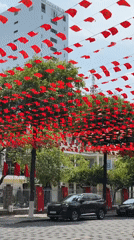 Red flags and lanterns decorate Nha Trang street