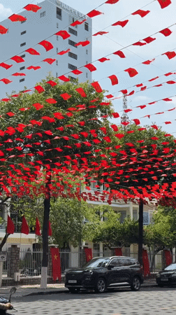 Red flags and lanterns decorate Nha Trang street