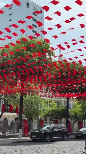 Red flags and lanterns decorate Nha Trang street