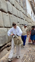 Tourists, locals mingle in historic Cusco streets, square