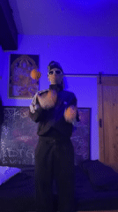 Tattooed Individual Juggling Oranges Captured Across Buenos Aires Locations