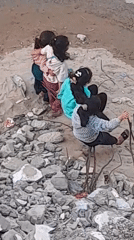 Children documented in Khan Yunis displacement camp amid rubble