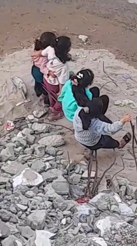 Children documented in Khan Yunis displacement camp amid rubble