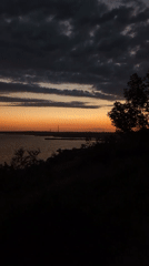 Twilight settles over the Kryvyi Torets River in Kostiantynivka