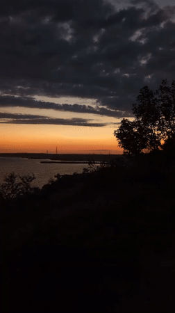 Twilight settles over the Kryvyi Torets River in Kostiantynivka