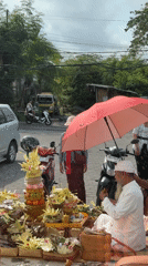 Traditional religious ceremony with offerings documented in Kuta Selatan