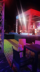 Nighttime outdoor performance draws crowd at Katambe venue