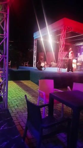 Nighttime outdoor performance draws crowd at Katambe venue