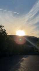 Morning outdoor moment captured on stone pathway near mountains