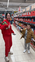 Woman and boy shopping together in Bulgarian store
