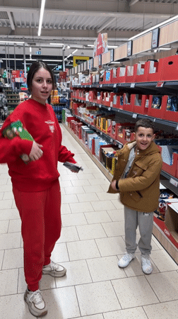 Woman and boy shopping together in Bulgarian store