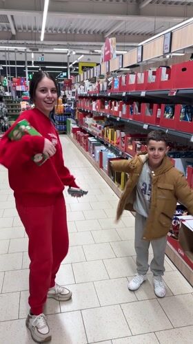 Woman and boy shopping together in Bulgarian store