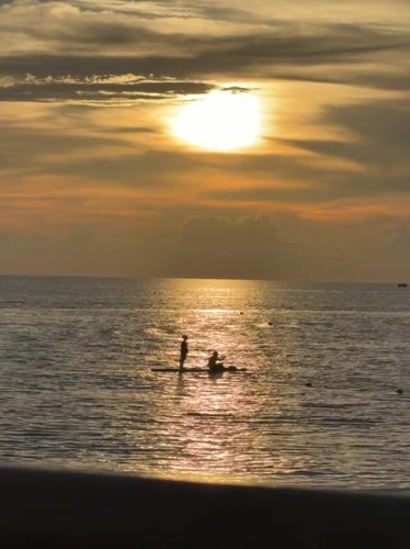 Evening sunset and coastal activities in Sochi, Russia