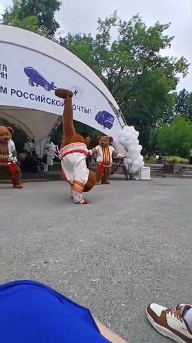 Summer public event in Yekaterinburg with mascots, stages, and games