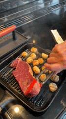 Home cook prepares seafood dinner in Wealden kitchen