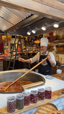 Chef works at spice shop in Liangjiang, China