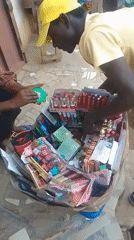 Street vendors serve families at outdoor market