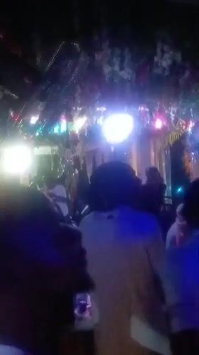 Nighttime gathering with colored lights observed in Akwanga, Nigeria
