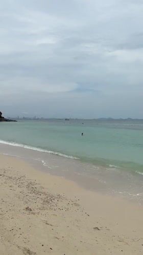 Morning beach scene documented in Pattaya City, Thailand