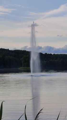 Lazy afternoon at a Rosinka lakeside park, fountain and all
