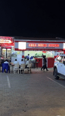 Nighttime social activity documented around Guzape commercial district