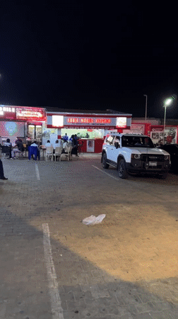 Nighttime social activity documented around Guzape commercial district