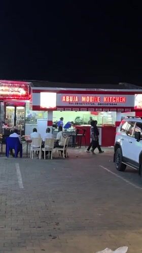 Nighttime social activity documented around Guzape commercial district