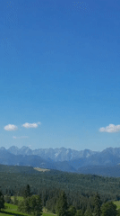 Drone and road views through Łapszanka's mountain landscape