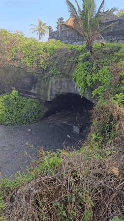 Bat cave and black sand coast in remote west Bali