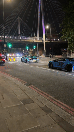 Luxury supercars spotted cruising central London near Thames Friday night