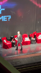 Gray-haired man walks across staged set in Odesa