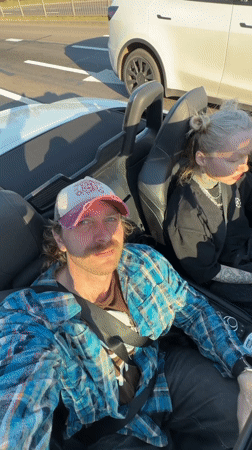 Couple spotted in convertible during bright day in Brest