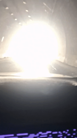 Driver traverses tunnel, emerges into Tajikistan mountain landscape