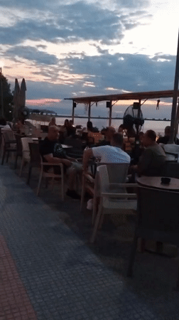 Neoi Epivates waterfront comes alive on a July evening