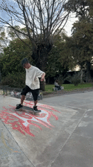Skateboarder in numbered shirt filmed at Buenos Aires park