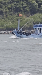 Morning boat traffic observed in choppy Nha Trang waters