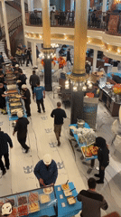 Construction workers gather for buffet lunch in Brest renovation site