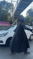Batman-costumed person directs traffic in Puebla, Mexico