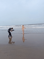 Morning beach activities documented at Mandrem, India coastline